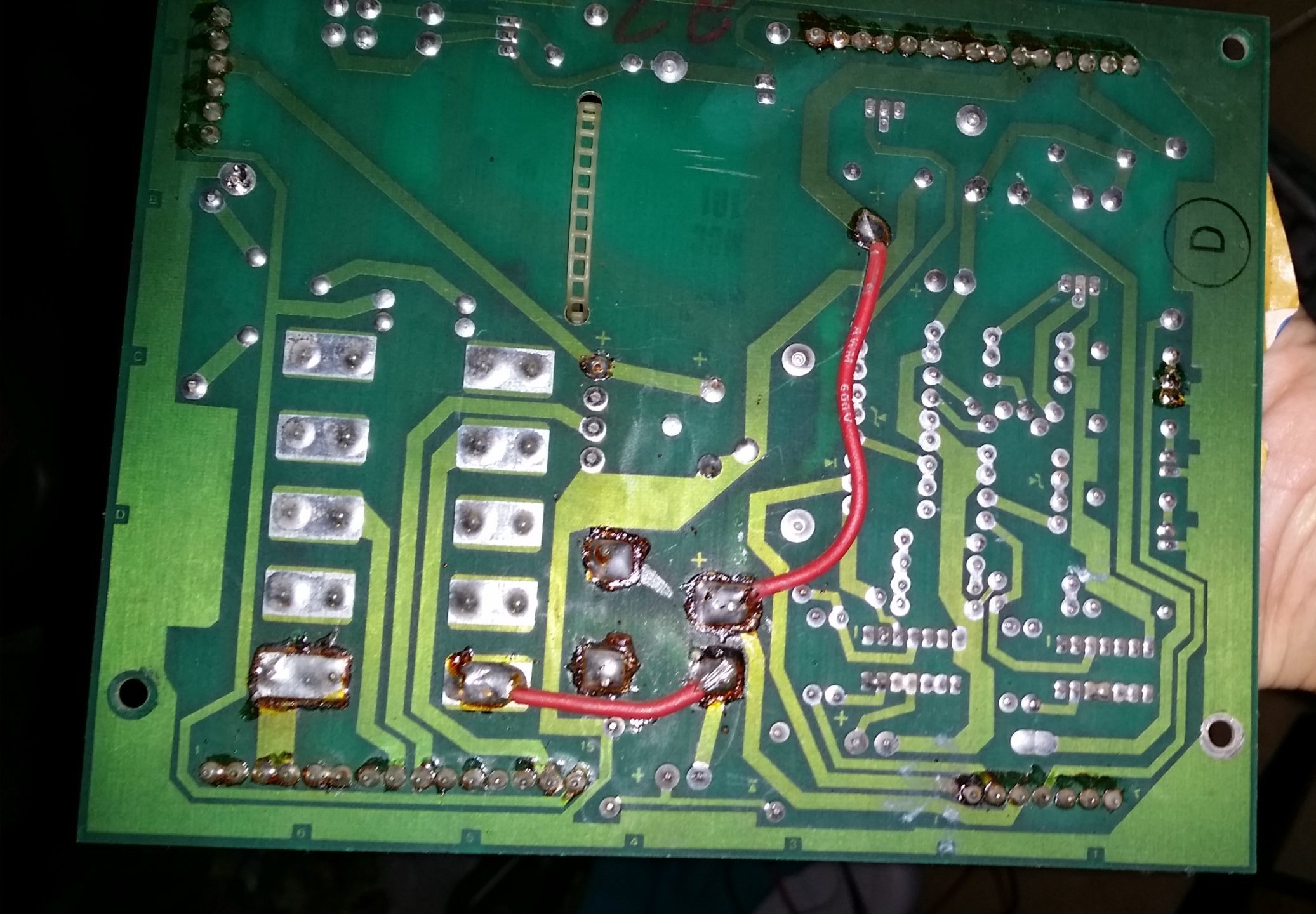 thick wires soldered to underside of power supply board
