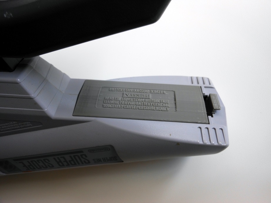 3D printed battery cover in a Super Scope